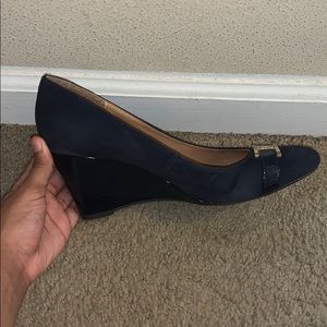 Closed toe navy blue wedge